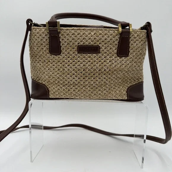 Rosetti straw tote handbag with brown faux leather trim and top handles. - Picture 1 of 16